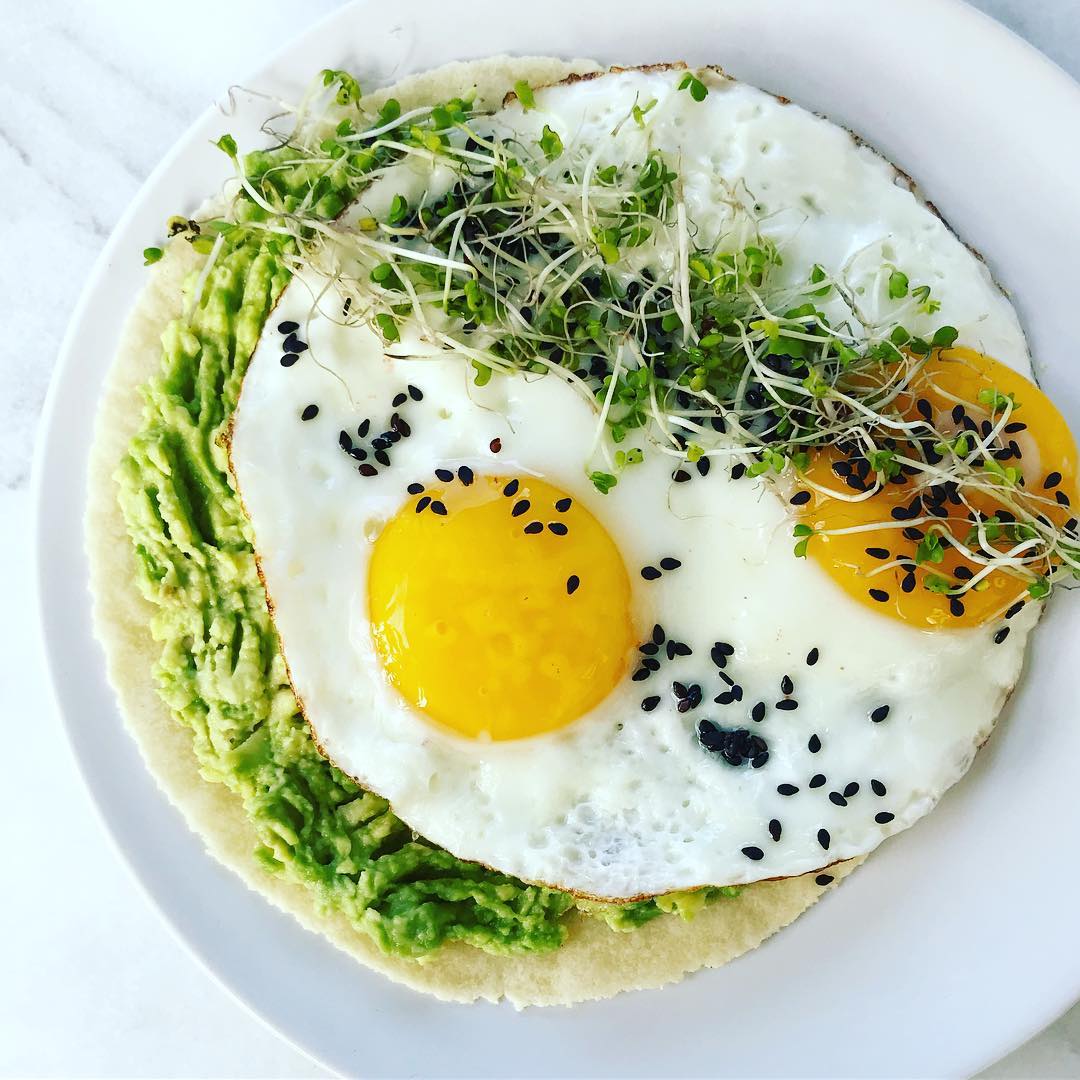 Eggs with sprouting broccoli seeds on top healthy recipe