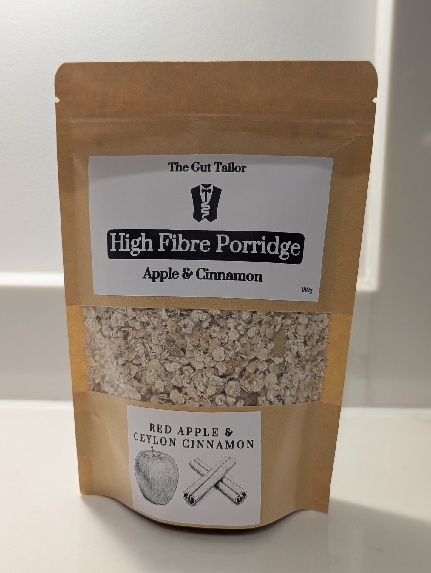 Package of High Fibre Porridge with Apple & Cinnamon flavor on a white background