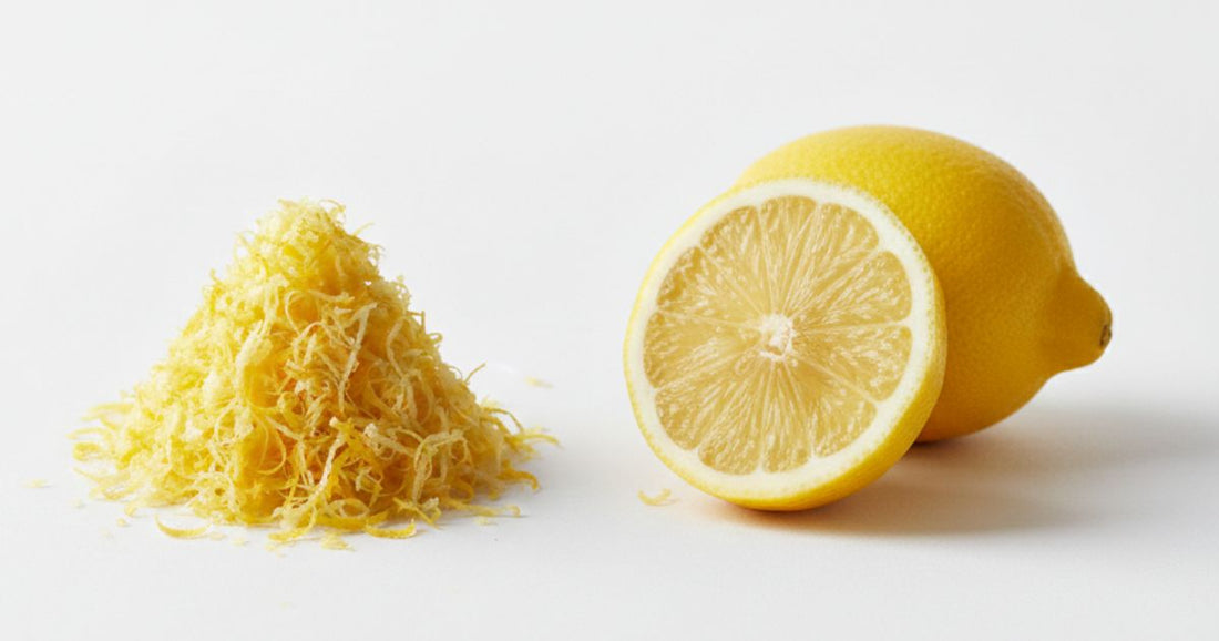 Close-up of lemon peel zest on white surface showing citrus peel benefits and natural citrus peel extract for digestive health