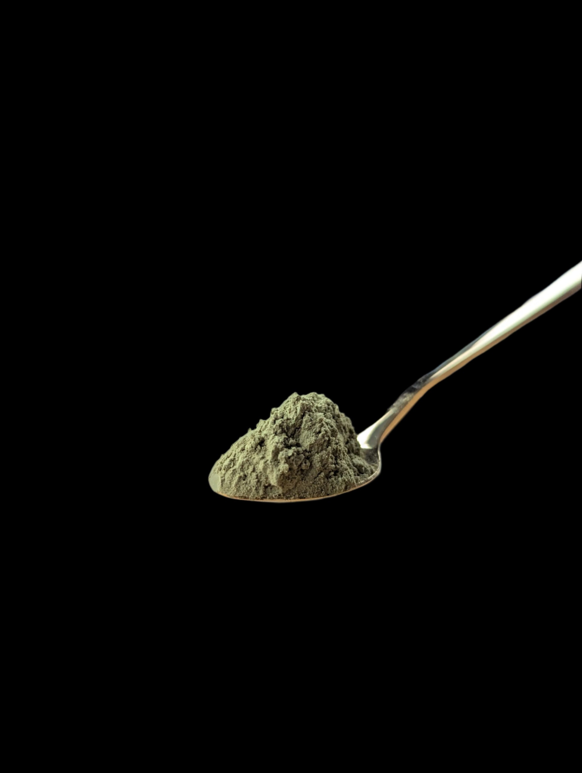 A spoon of matcha green tea powder