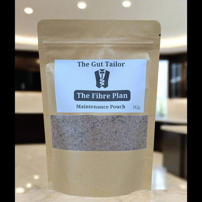 Front view of The Gut Tailor The Fibre Plan maintenance pouch standing on a kitchen counter